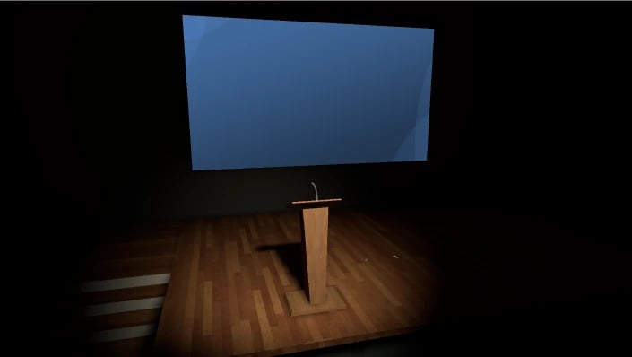 Environment, lecture theatre with a wooden podium and a large blue projection screen.